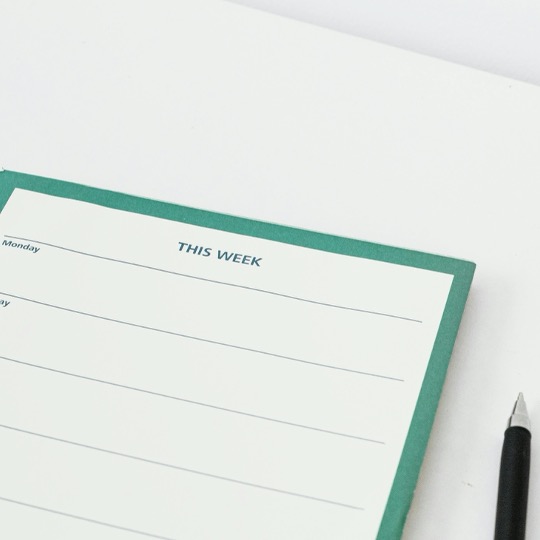 Marketing and content strategy A calendar and pen