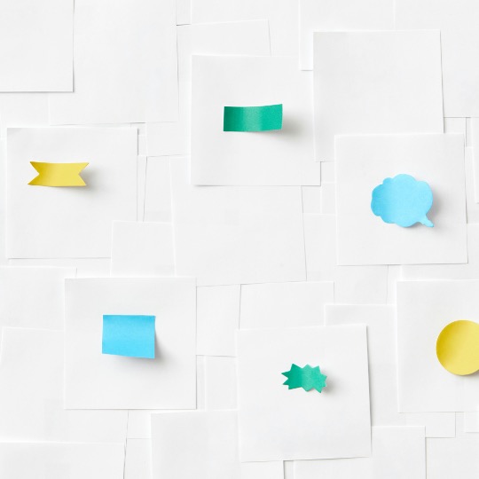 Project and operations management Paper with stickers of different shapes